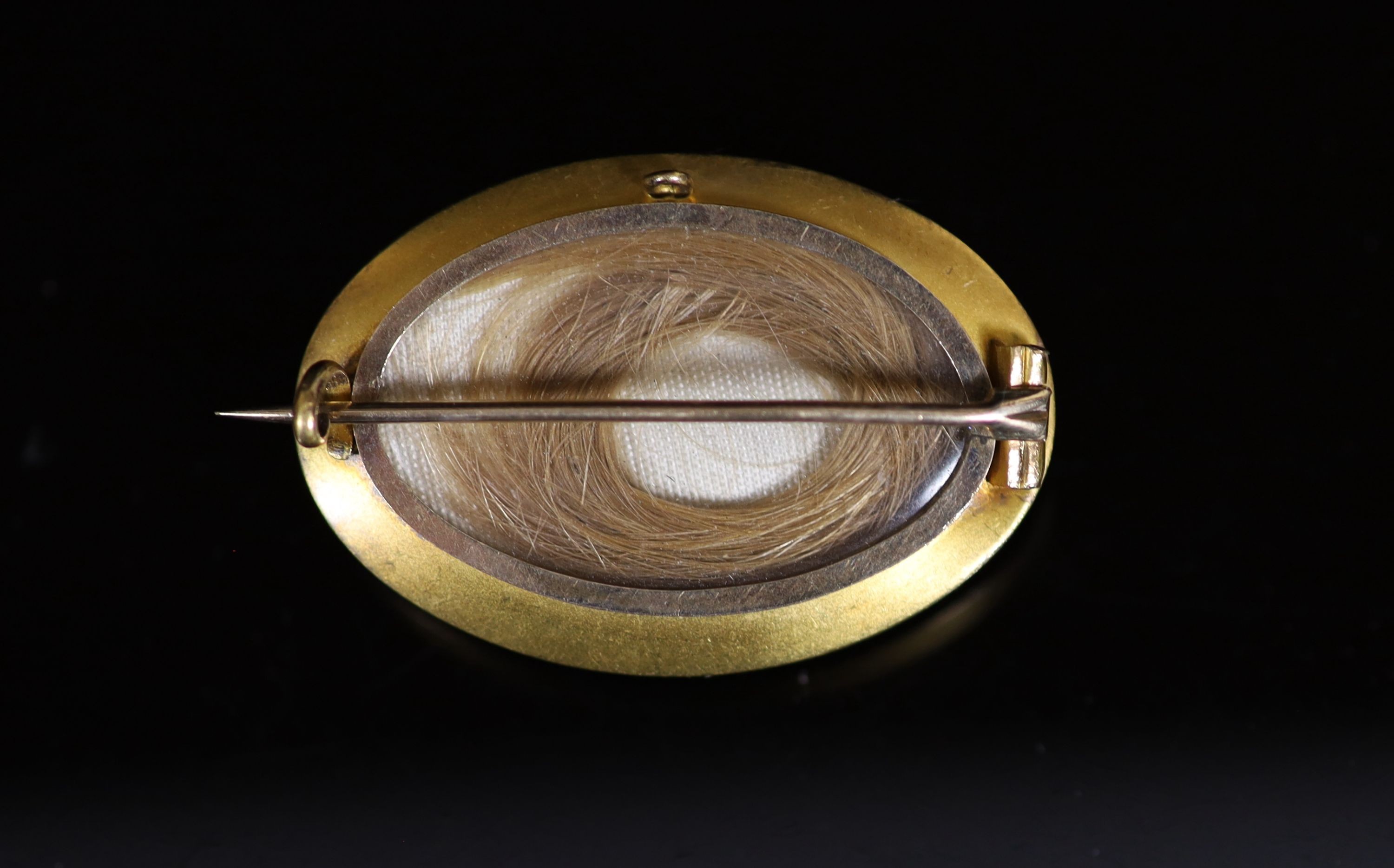 A Victorian gold, split coral and split pearl set oval brooch